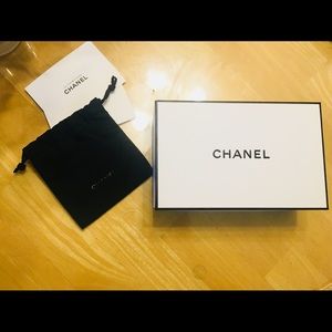Chanel Box with a small black bag